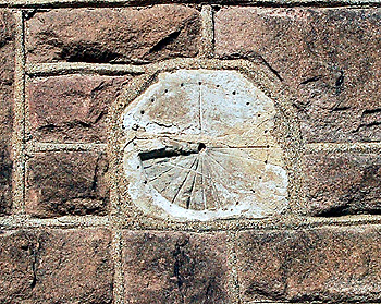 Anglo-Saxon scratch dial set into the west wall of the west tower March 2011